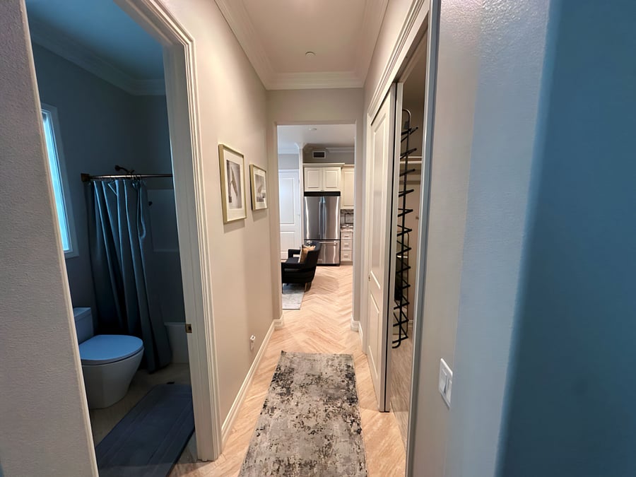 Hallway with Bathroom and Walk in Closet