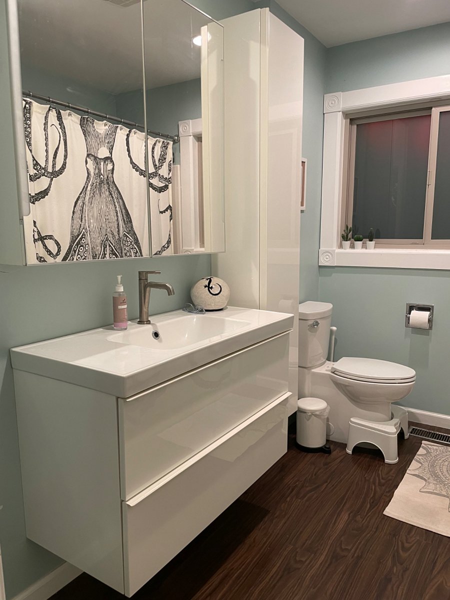 Bathroom with tub and shower