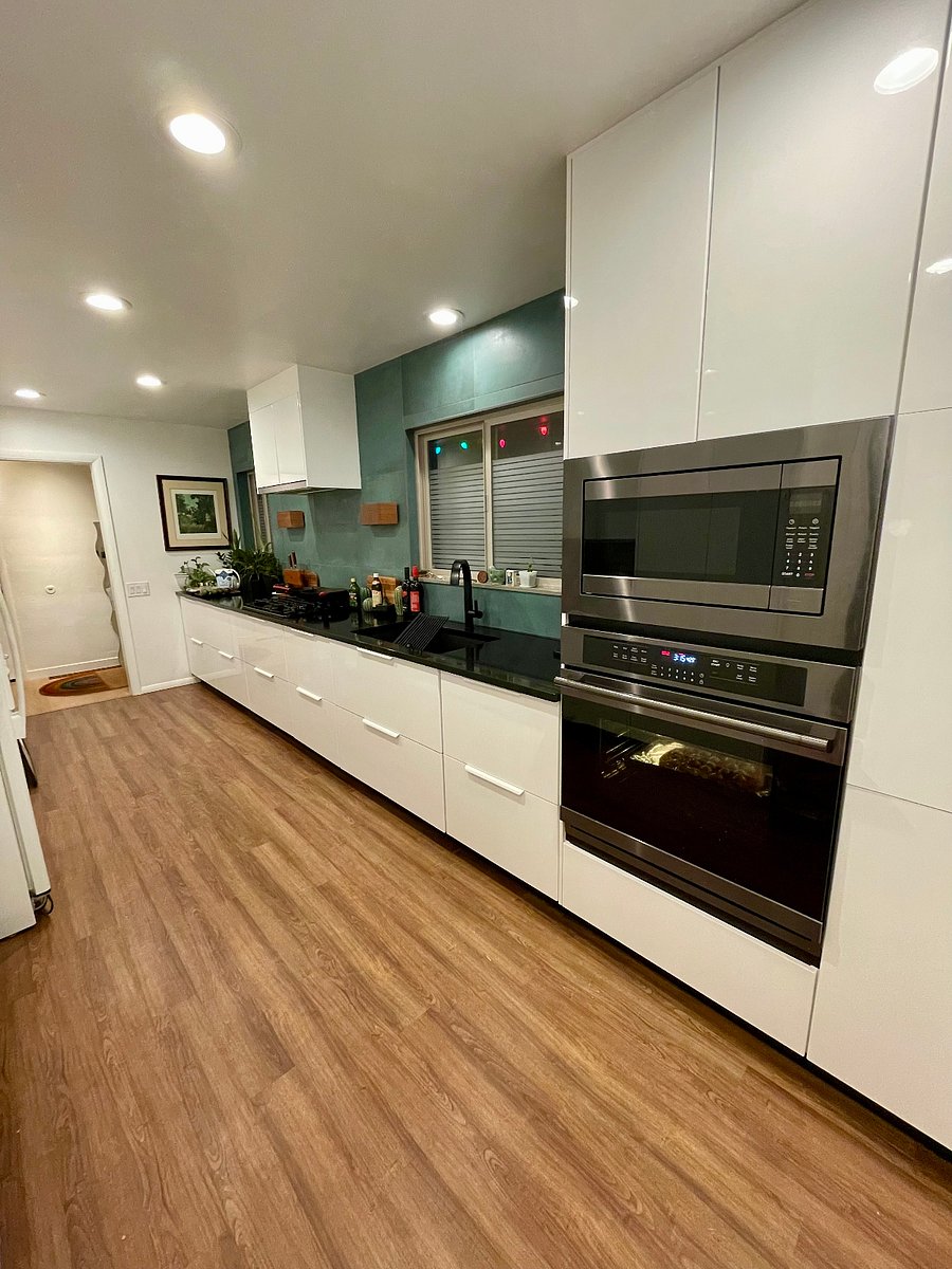 Newly remodeled galley kitchen with gas range