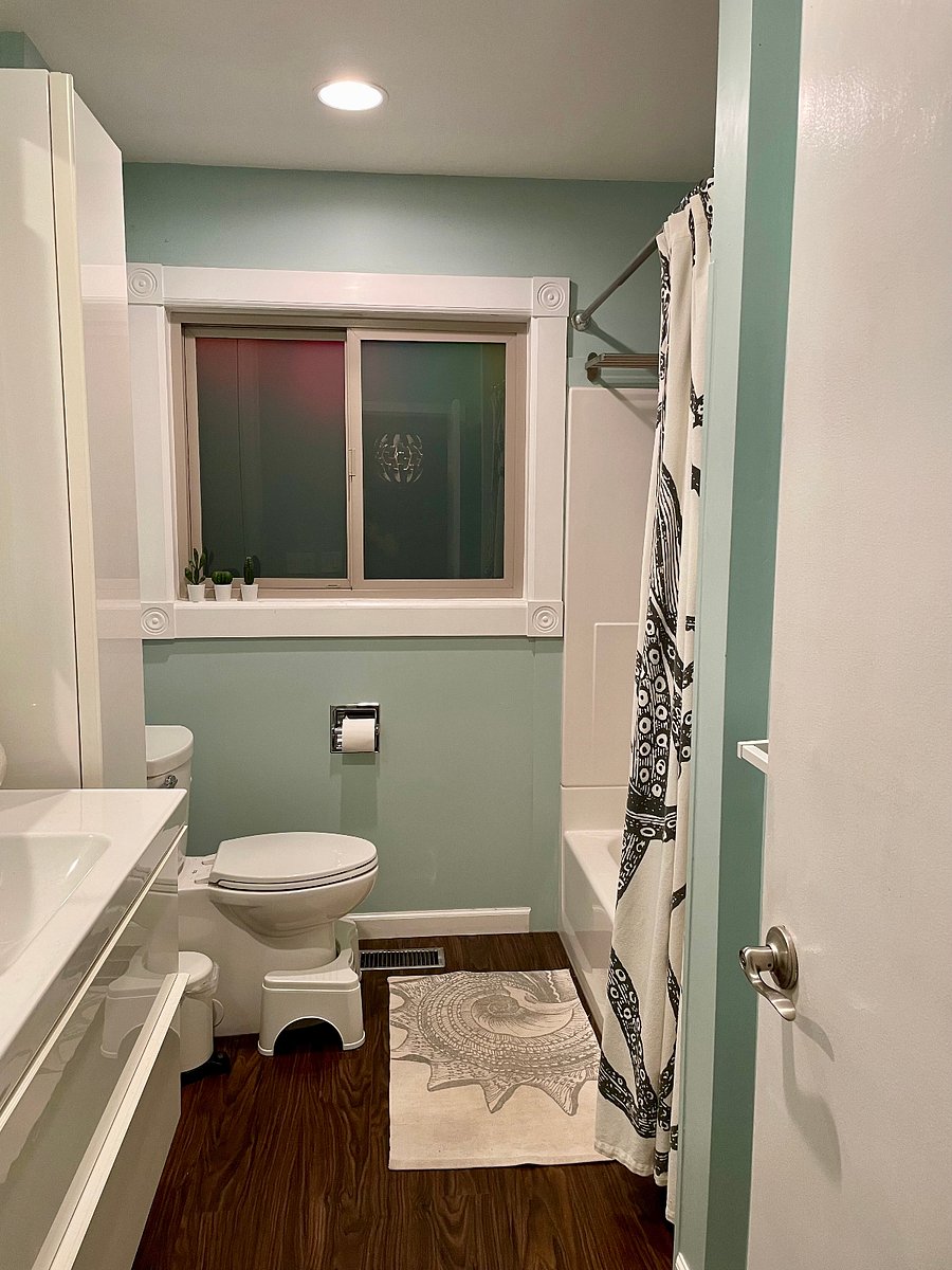 Bathroom with tub and shower