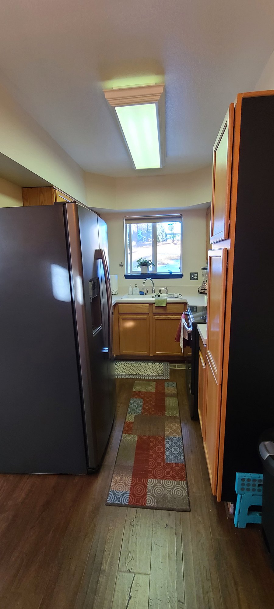 Fully stocked kitchen with all cookware, plates, glasses, storage containers, spices, etc.