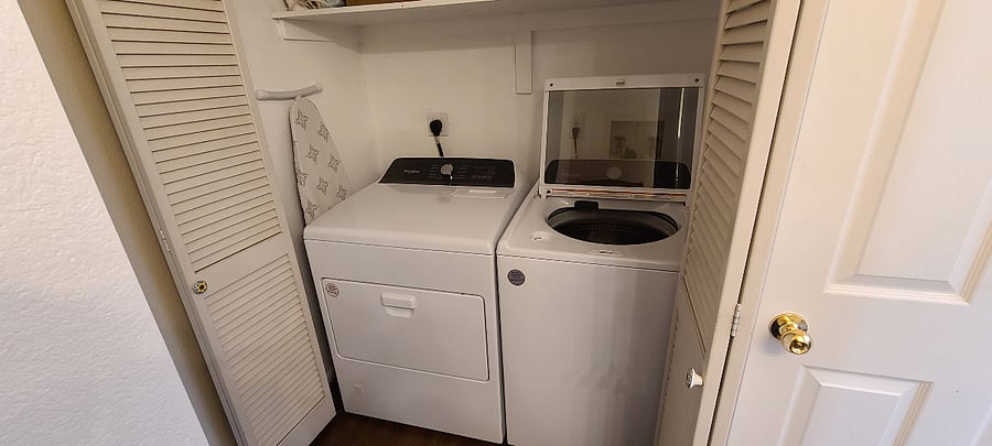 NEW washer & dryer makes laundry day a breeze to do at home! Full size ironing board and iron available.