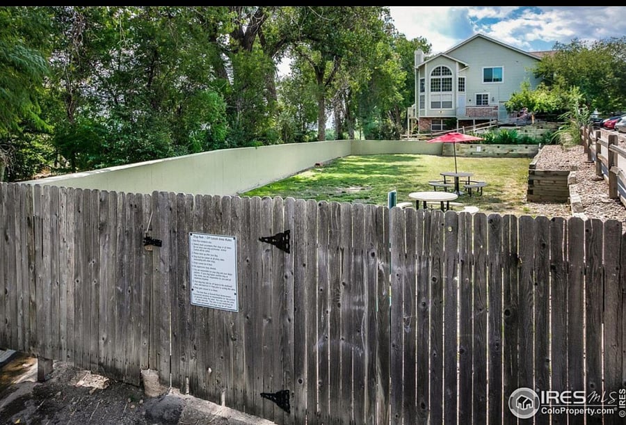 Private community fenced pet recreation area w/ seating to watch your furry friend play!
