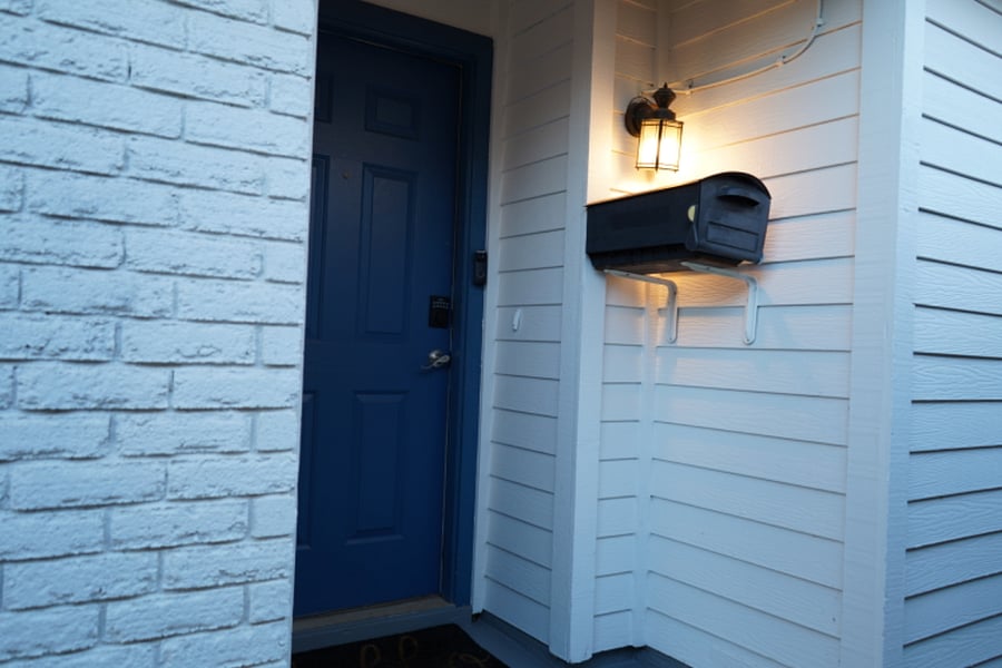 Main Entrance with digital dead bolt and automatic porch light and extra large mail box