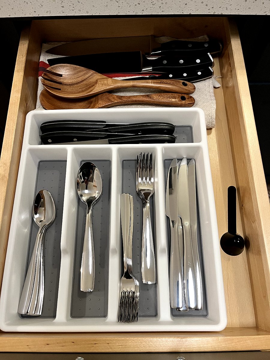kitchen includes basic eating and cooking utensils