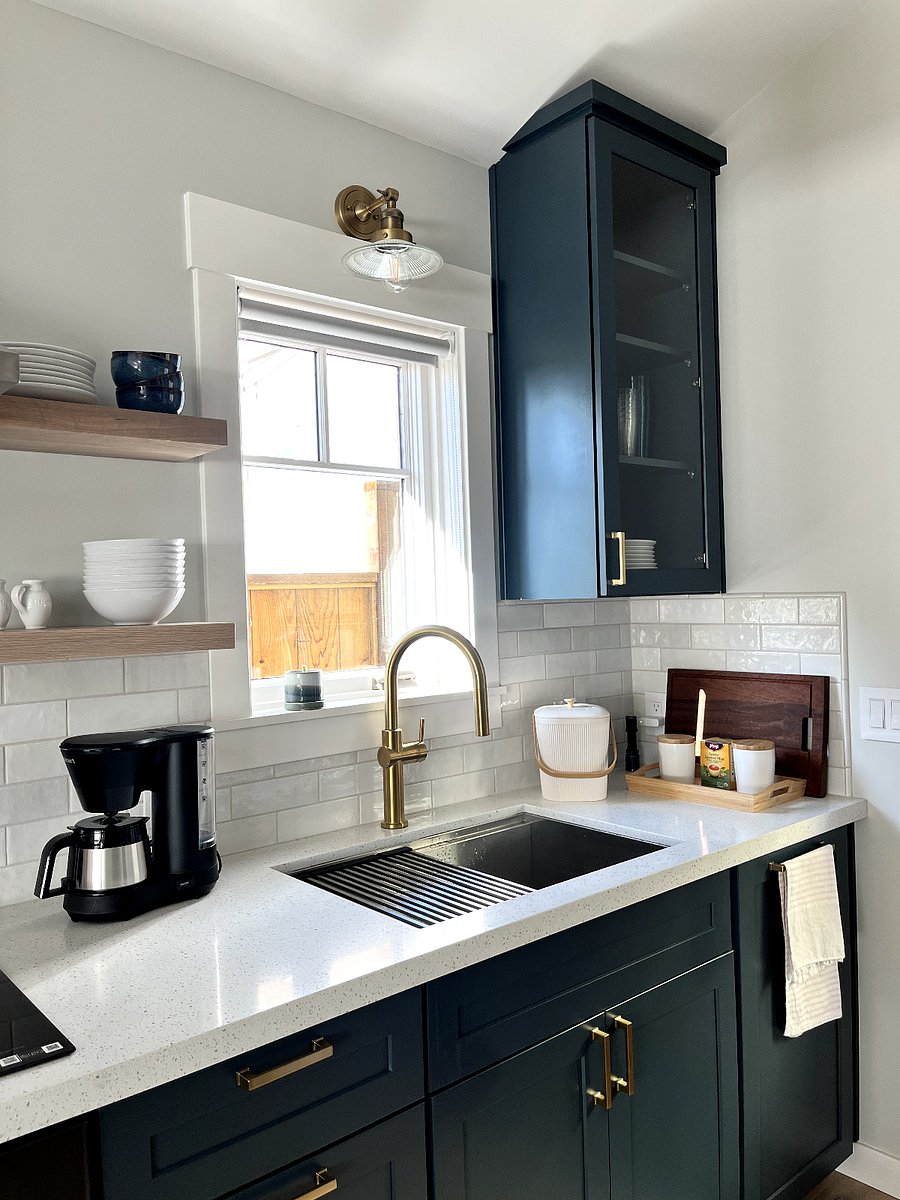 large sink with pull-down faucet and other amenities
