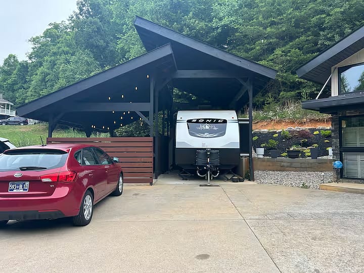 Parking would be here in front of the camper that we also Airbnb but you would be the first spot next to your door