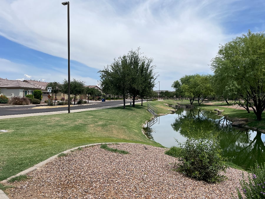 Unit is located directly across street from Serene creek leading directly to large Layton Lakes park with walking/jogging trail around the lake + Soccer, Basketball Field. 