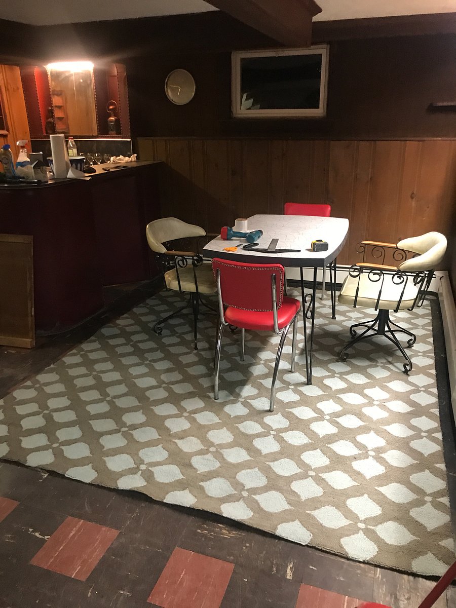 This is the funky 1960s basement room complete with bar area, fold out sofa bed, and smart TV