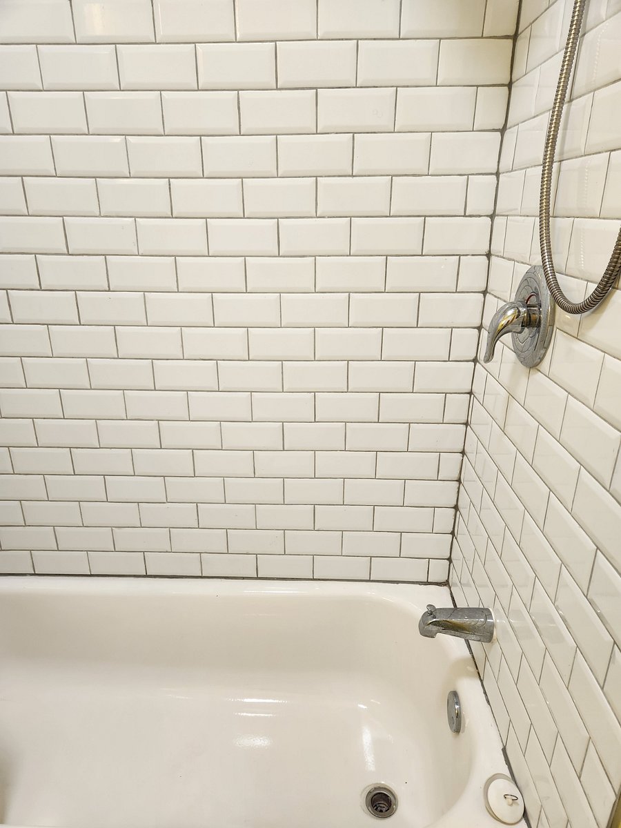 Full bath with massaging shower
