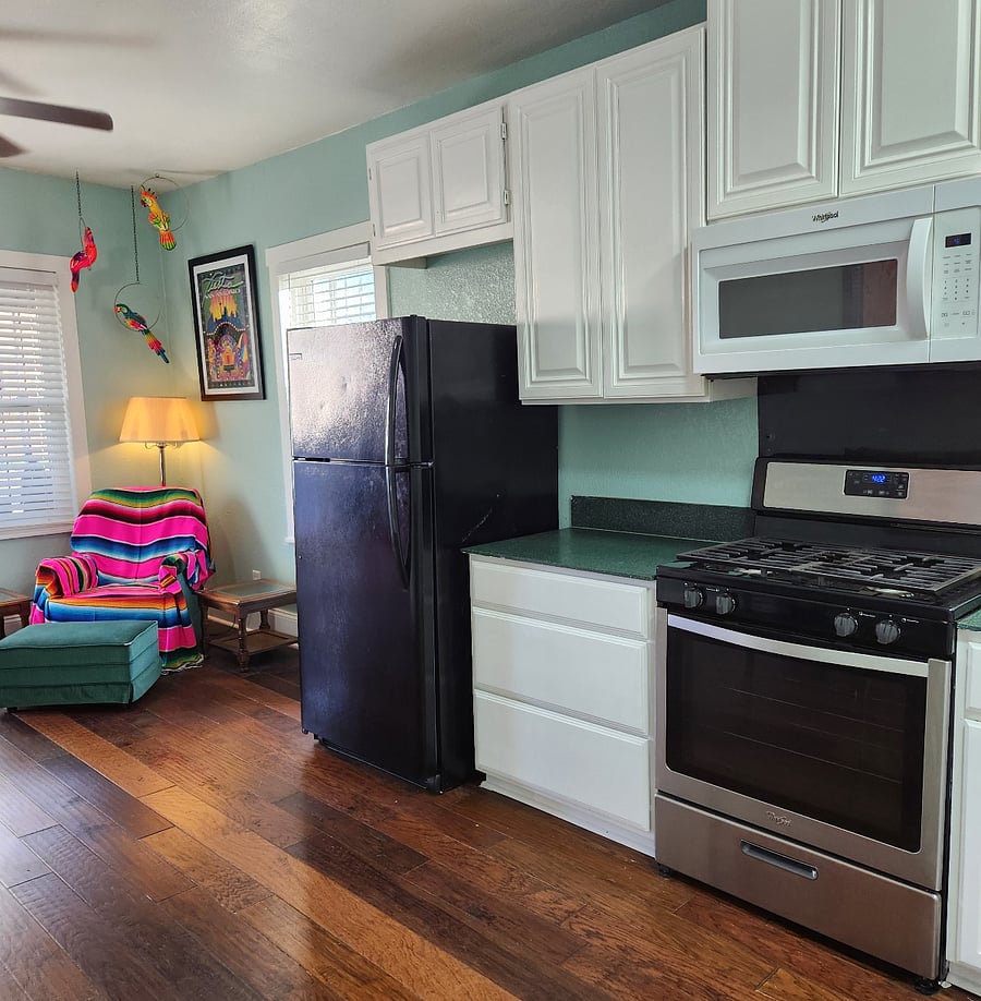 Panning around to kitchen space.