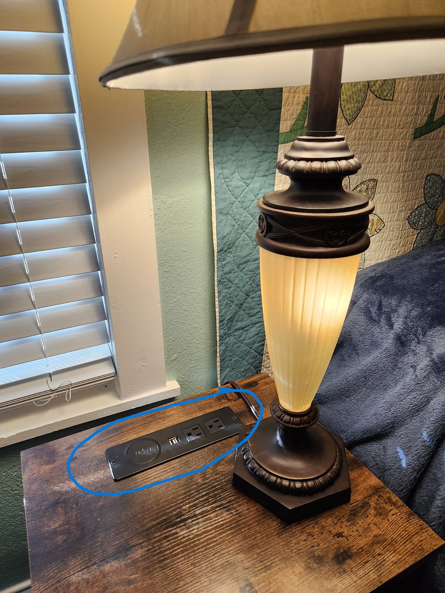 Both nightstands have USB plugs, electrical outlets and wireless charging. Both lamps have three levels of light.
