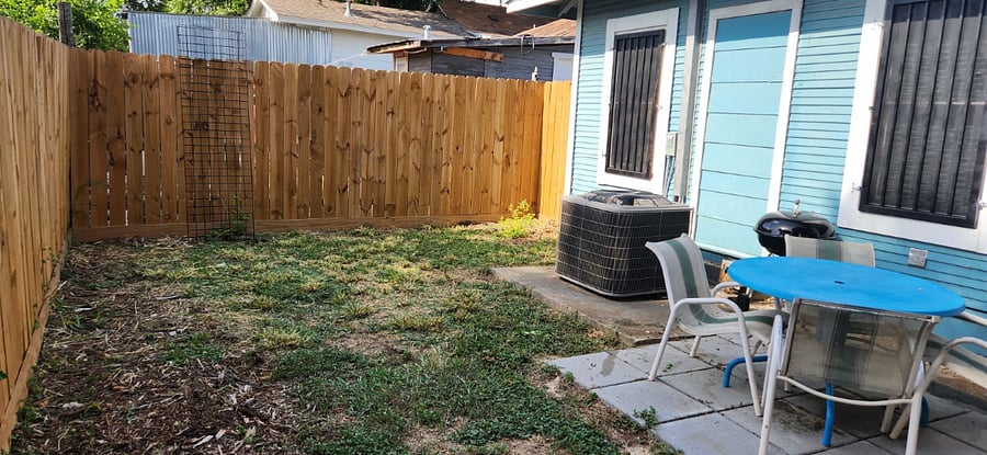 Private back yard with privacy fence.
