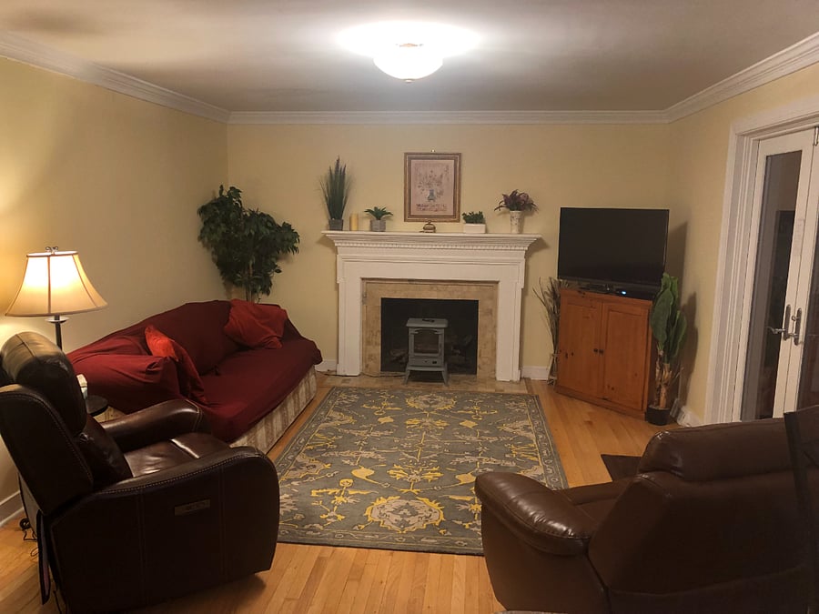 Two new for 2023 leather power recliners.Door on right leads to deck. Small electric fireplace. ( larger one
non working )