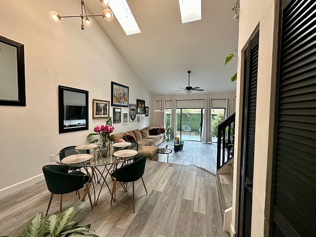 Dining room with living room and private front porch