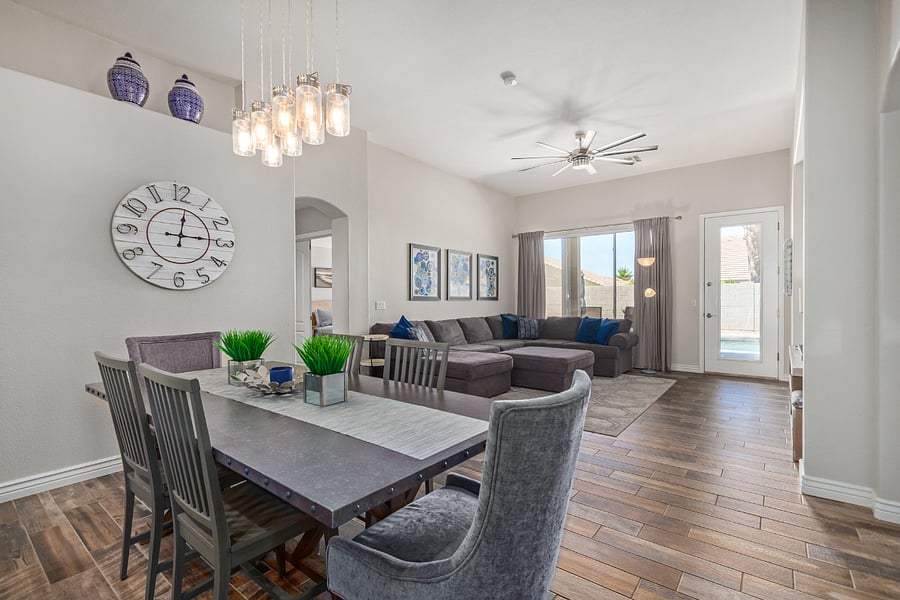 6 person dining table with 3 bar stools at the kitchen island