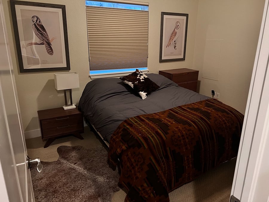 3rd Bedroom: Queen Bed, closet and attached bathroom with shower.