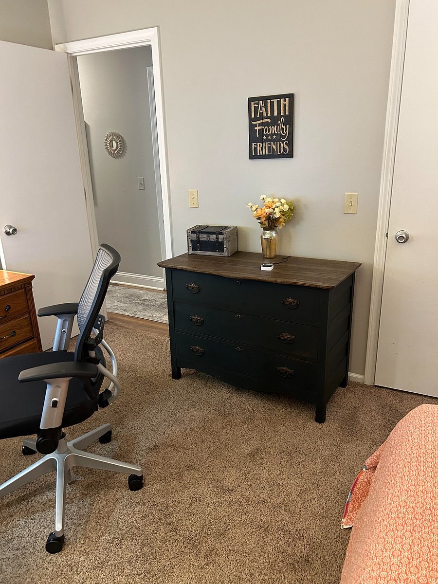 2nd bedroom with twin bed and desk and dresser