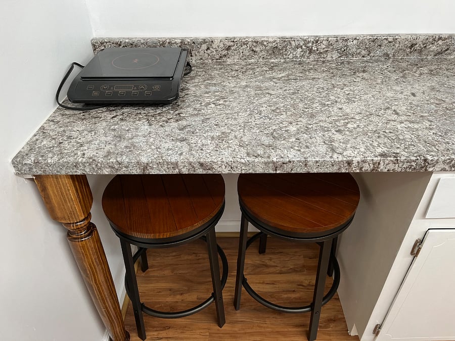 Seating for two at counter height bar top.