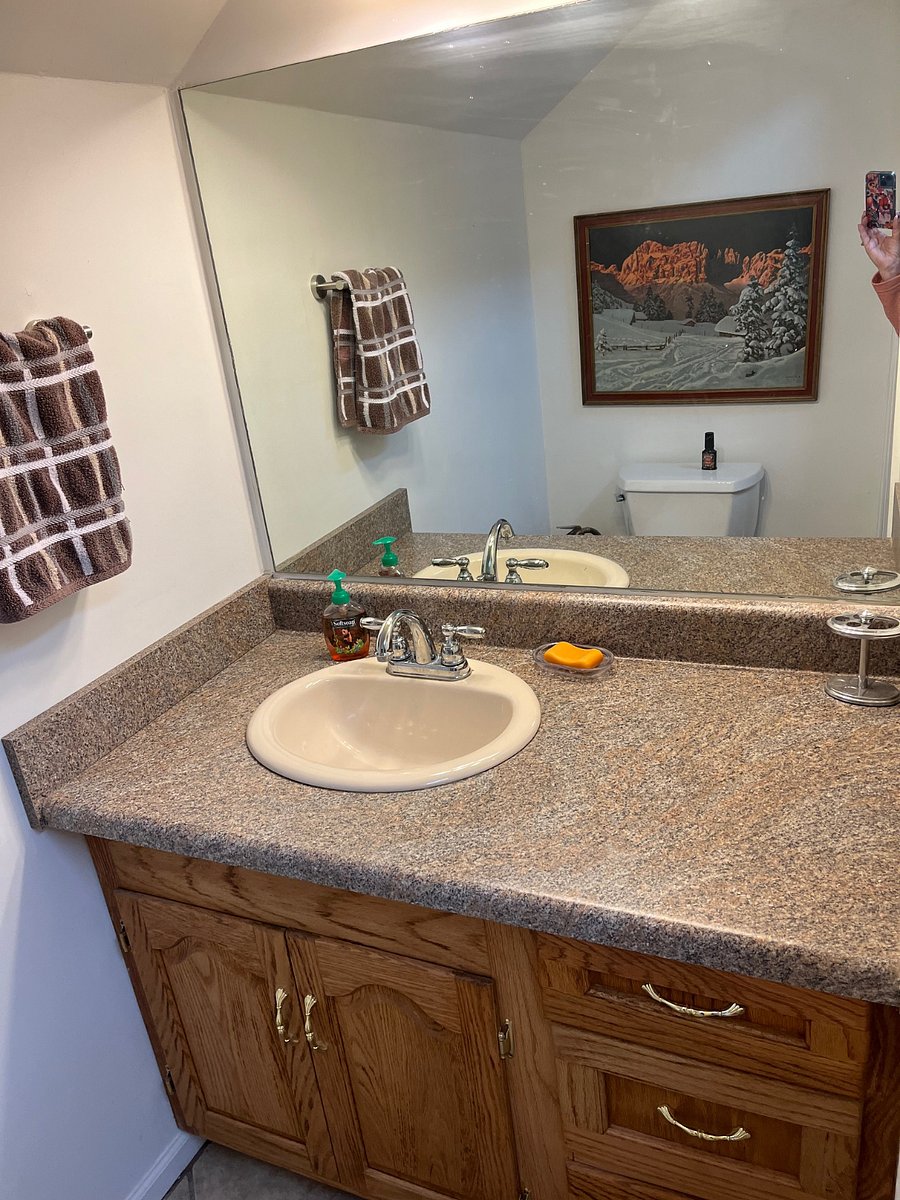 Bath with plenty of vanity storage. 