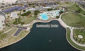 Large community center dining pools patio lounge area. 
