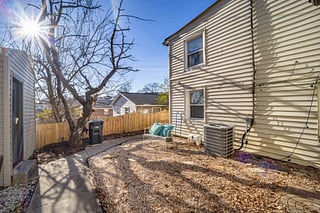Exterior view outside cottage door.