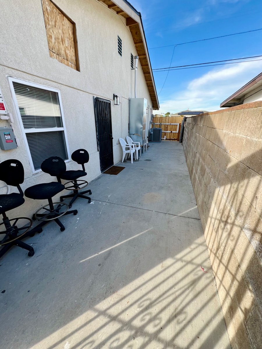 Bedroom 2 Door/Little patio seating area (will have an awning above door soon).