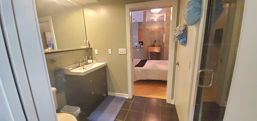 Large, professionally cleaned and sanitized bathroom.