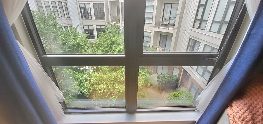 Bright view of courtyard from large window in living room :)
