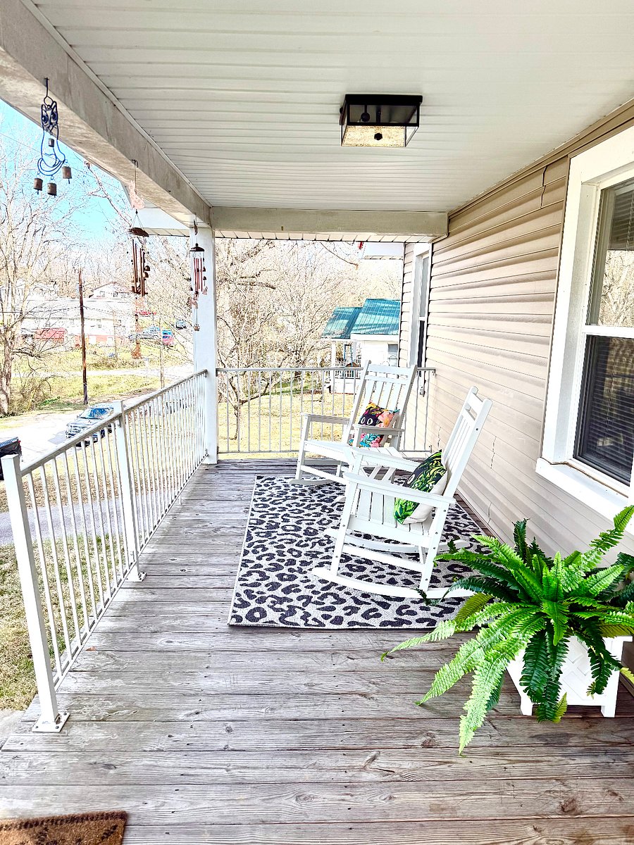 Front porch vibes and back porch vibes at The Bad Kitty Cottage