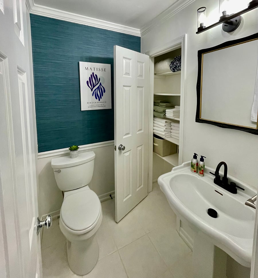 Master en-suite half bath with window 