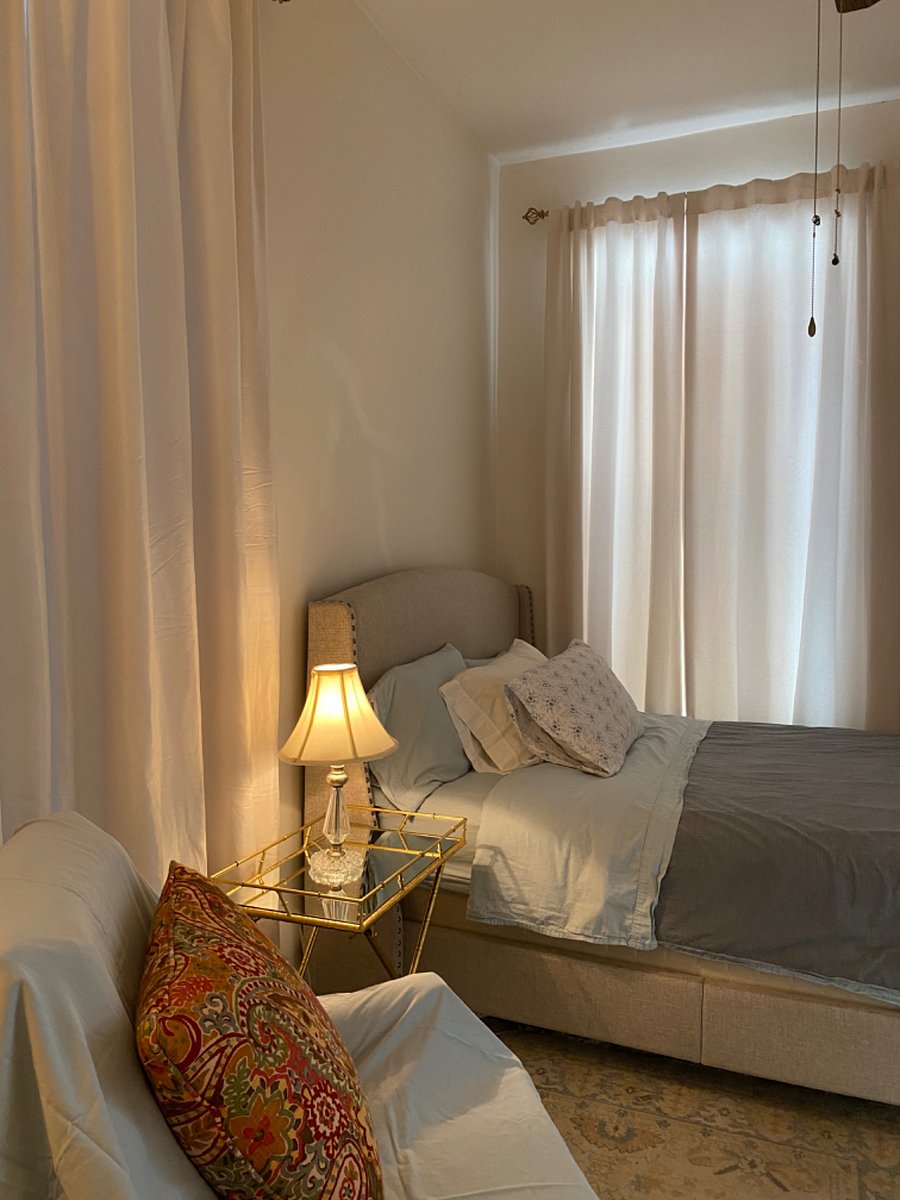 Very comfortable bed (Stearns & Foster) and organic cotton bedding- cozy with room darkening shades and drapes.