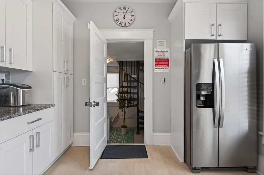 Main Floor - Kitchen @ Laundry and Spiral Stairs.