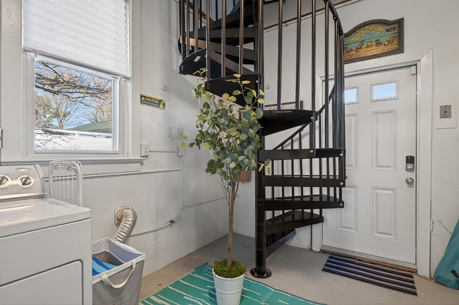 Main Floor - Laundry Room @ Sprial Stairs to Loft Area