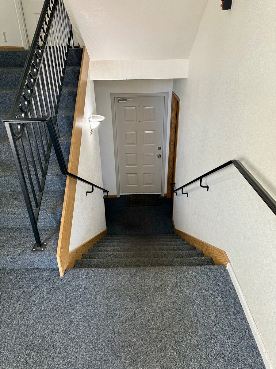 After you enter the outside door there are 8 stairs down to the front door.