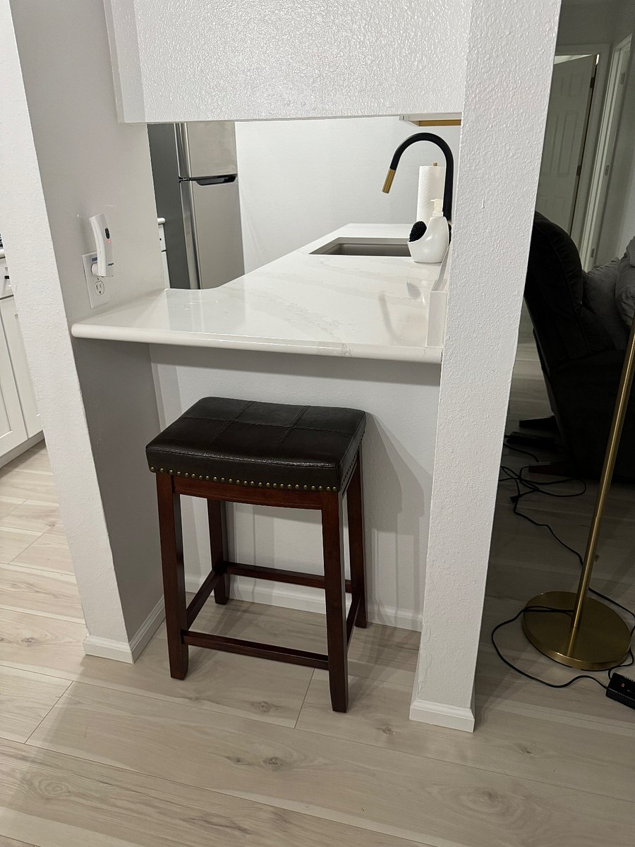 A cozy little nook built into the kitchen-perfect for a computer.