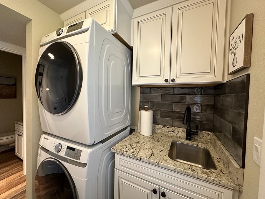 The laundry room has a brand new, stackable Samsung washer and dryer. Detergent, softener and other laundry supplies will be provided. This space also has two closets - 1 for pantry and food storage and the other for miscellaneous cleaning supplies.
