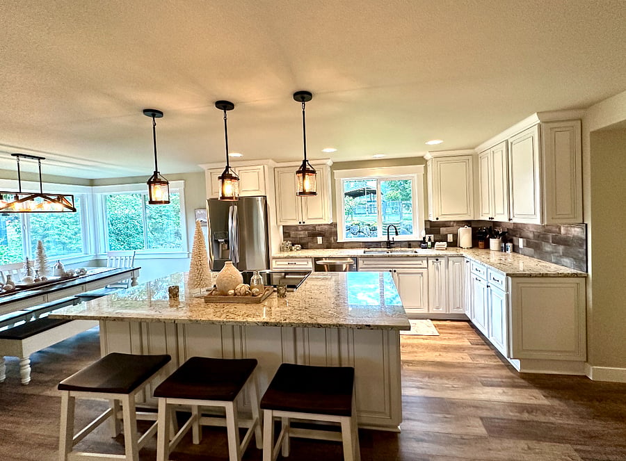 The kitchen features all brand new appliances including Induction cooktop, microwave, dishwasher and LG French door refrigerator/freezer. The new cabinetry, granite counters and custom lighting finish off a beautiful space to create delicious simple or fancy meals!