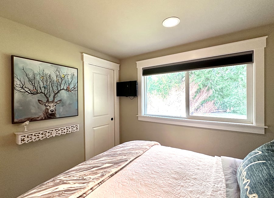 There is a black out shade of the east fading window offering a gorgeous pastoral view.