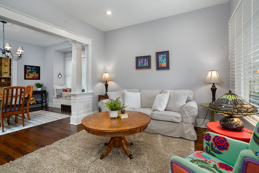 Living Room. Full size couch, 2 side tables with lamps, games, books.