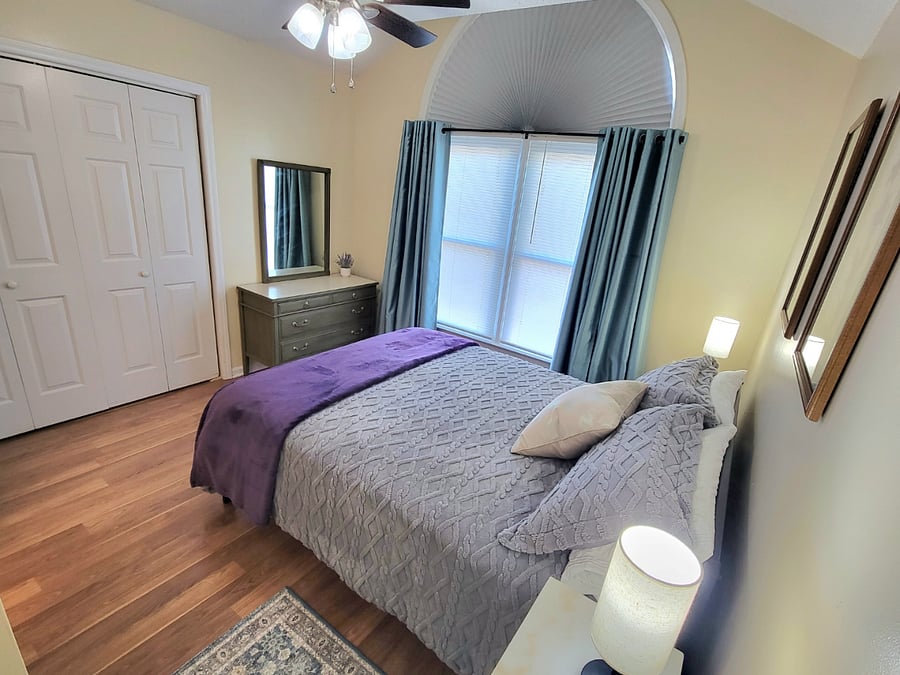 Queen bedroom with large closet and dresser