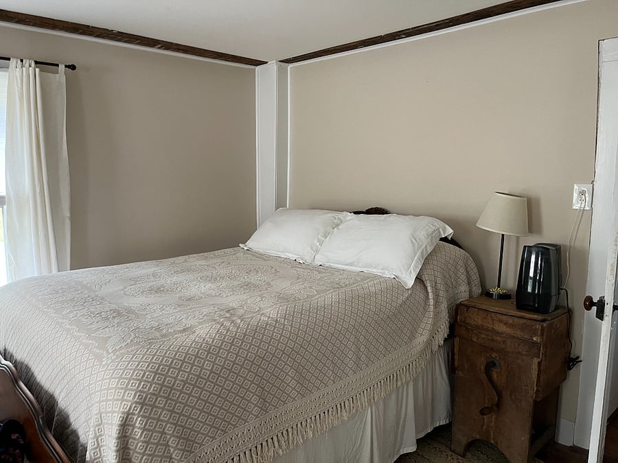 master bedroom with queen bed