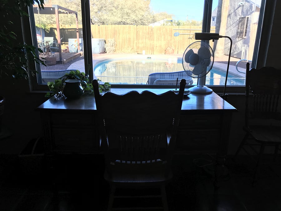 Working space desk looking out over pool.