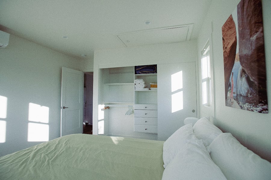 Closet with built-in drawers, shelves and  rods with room for all your clothes