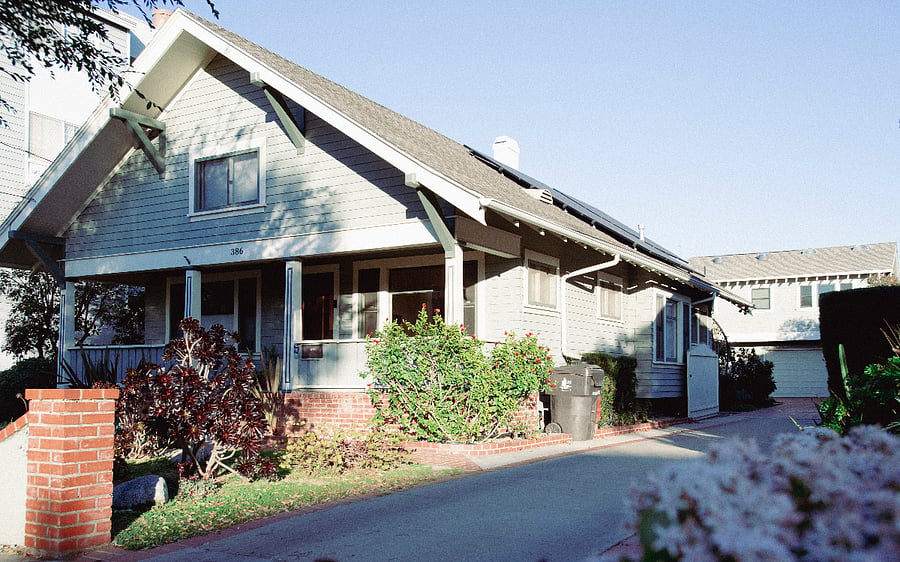 View of the front house with access to the guest house on the right side.