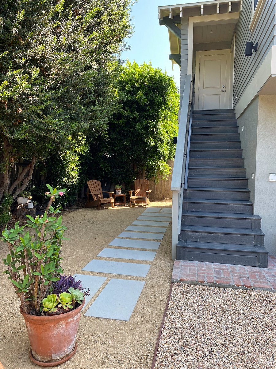 A reserved outdoor area is next to the guesthouse.