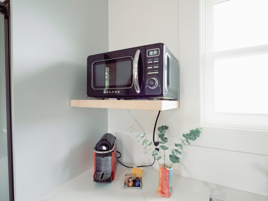 Microwave and Nespresso Coffee maker are part of the many included kitchen amenities