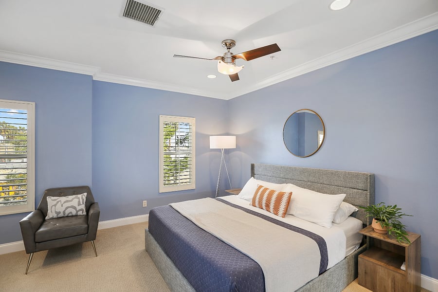 Primary bedroom with king-size bed.
