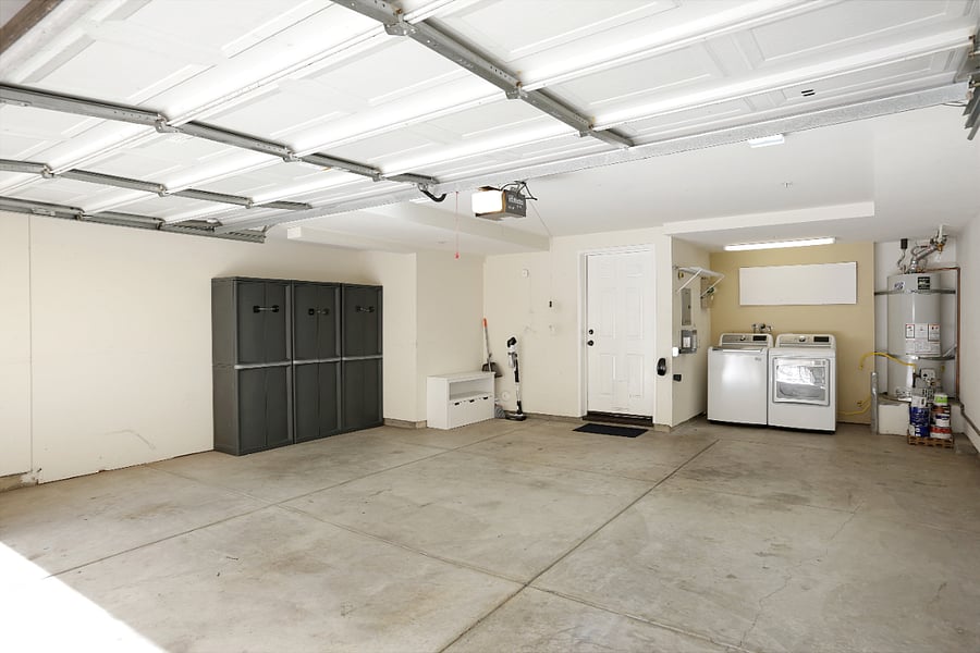 Attached private 2 car garage with full-size washer and dryer.