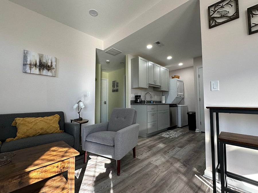 Living room, kitchen and hallway to the bathroom.